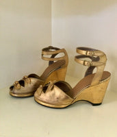 1940s Risqué Gold Wedges